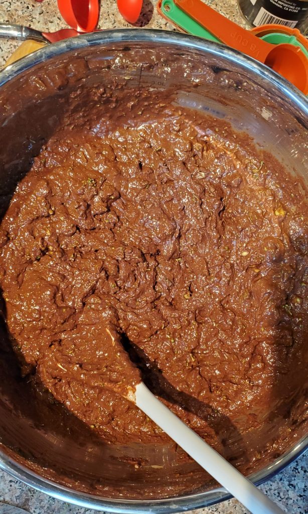 Wet and dry ingredients, and all of that broccoli, mixed together to create a tasty batter!
