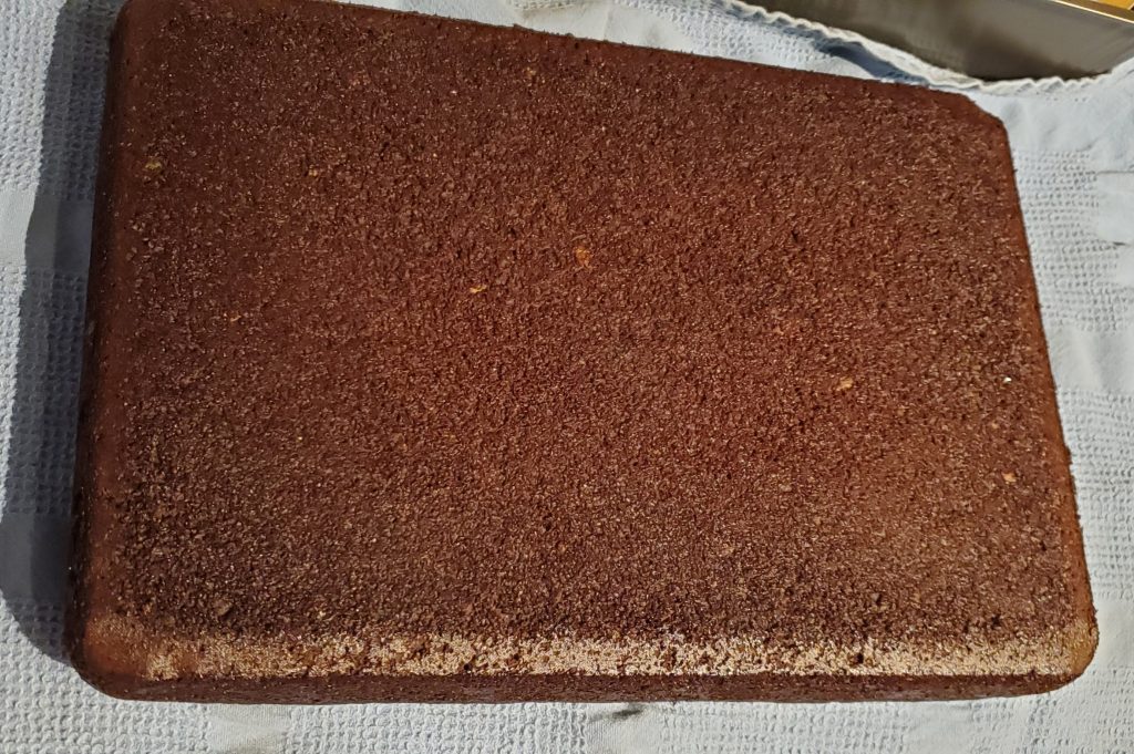 Cake cooling on a towel.
